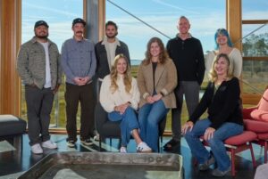 a group of people are posing for a picture