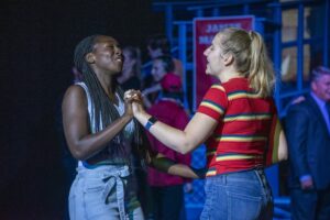 a couple of women standing next to each other
