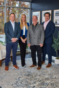 a group of people standing in a room
