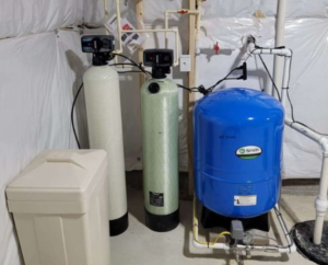 a couple of water tanks sitting next to each other