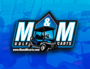 a golf cart with the m & m golf carts logo on it