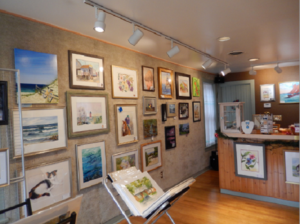 a room with a lot of pictures on the wall