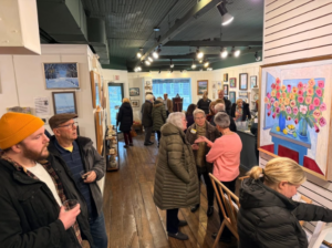 a group of people standing in a room