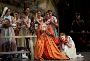 a group of people standing on a stage