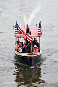 a group of people riding on a boat in the water