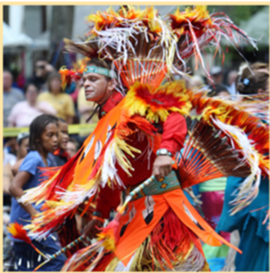 a woman in a red and orange costume